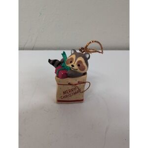 VINTAGE MANGELSEN'S RACCOON IN GIFT BAG 2.5" ORNAMENT